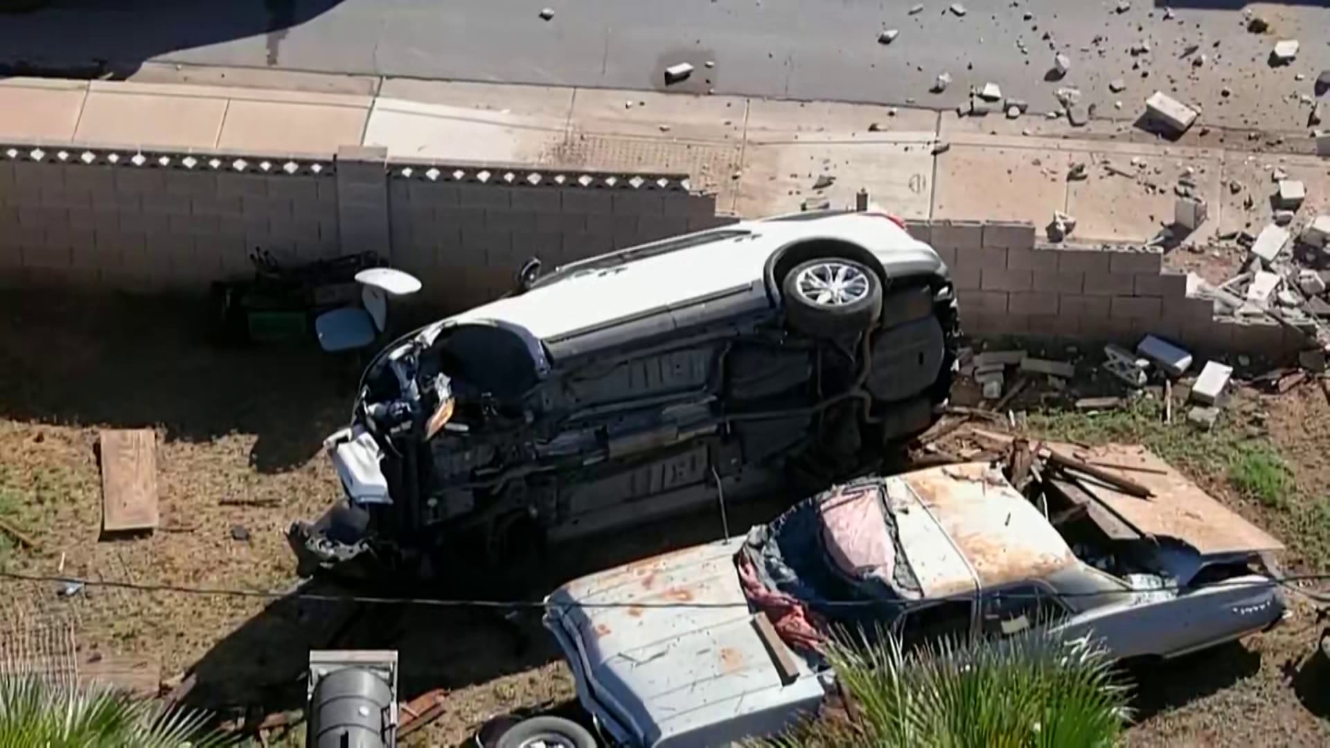 SUV Crashes Through Backyard Wall in South Phoenix