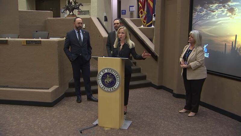Mayor Lisa Borowsky speaks while City Councilman Adam Kwasman, right, Rep. Alexander Kolodin,...