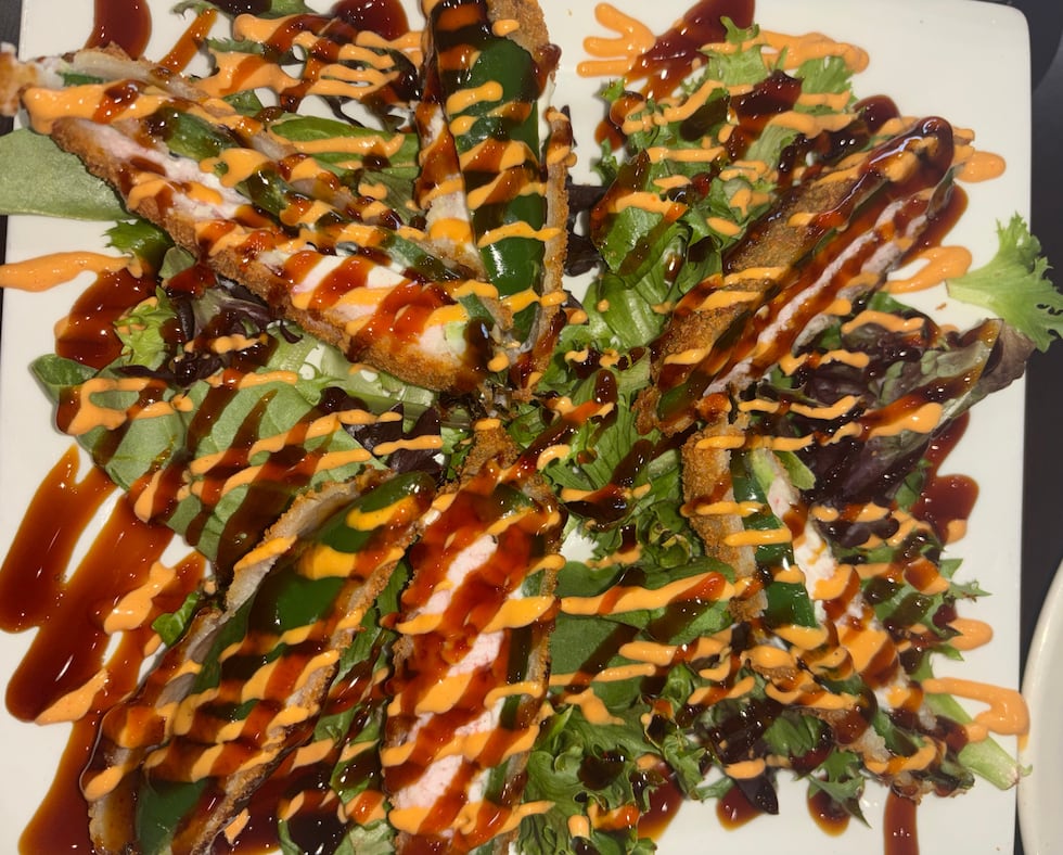 "Jalapeño Firecrackers" made with fried jalapeños, stuffed with tuna, cream cheese & Surimi...