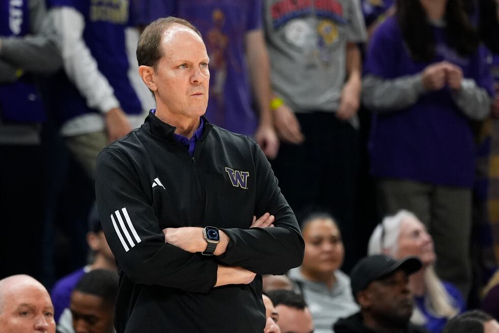 Washington head coach Mike Hopkins looks on from the sideline during the second half of an...