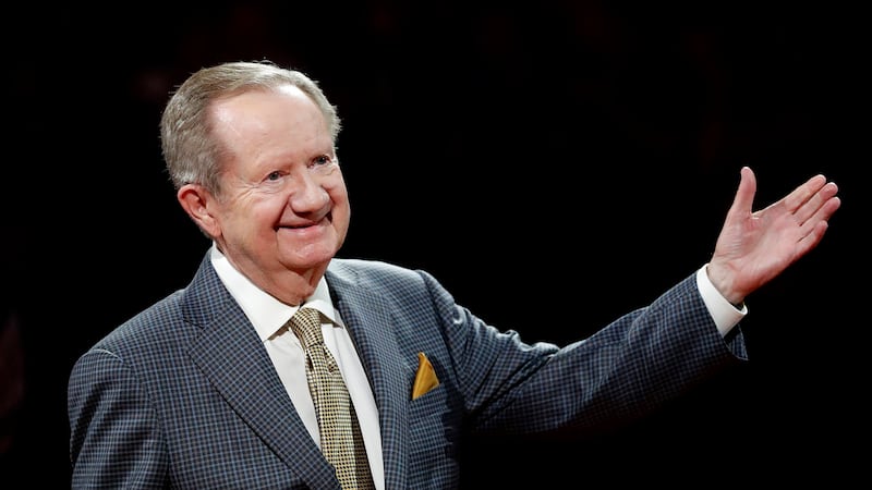 Phoenix Suns announcer Al McCoy acknowledges the crowd during his ring of honor induction...