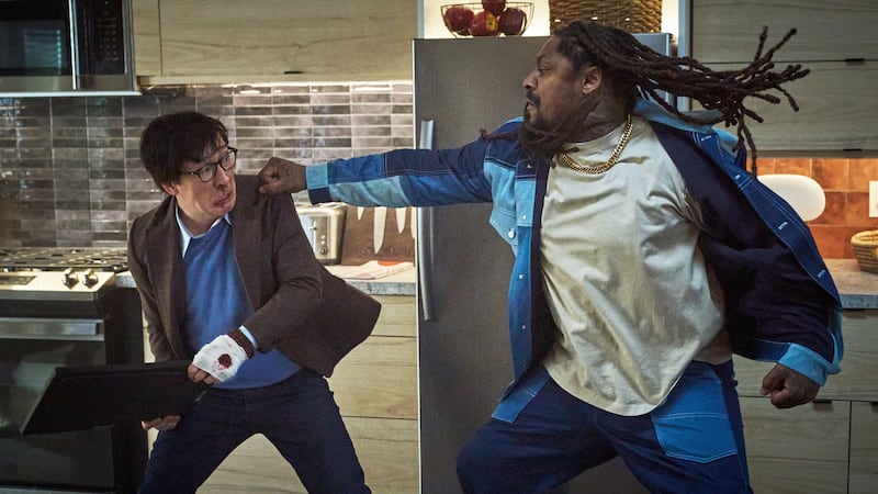 (from left) Marvin Gable (Ke Huy Quan) and King (Marshawn “Beastmode” Lynch) in Love Hurts,...