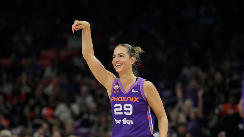 Phoenix Mercury guard Jovana Nogic smiles as she celebrates a 3-pointer against the Chicago...