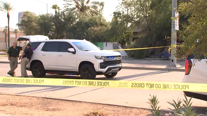 A central Phoenix road is shut down Saturday morning as police investigate a crash.