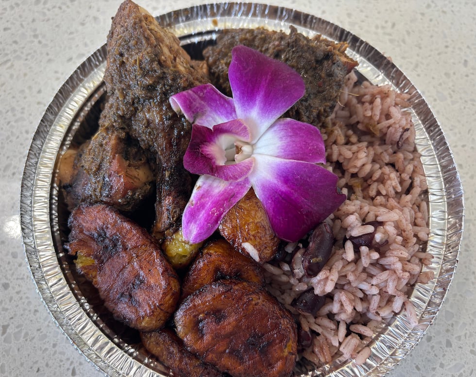 The Jerk Chicken Entree comes with rice and peas or yellow rice and cabbage. Plantains, potato...