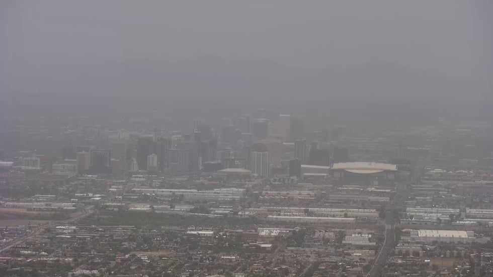 Hazy downtown Phoenix skyline as seen from atop of South Mountain park.