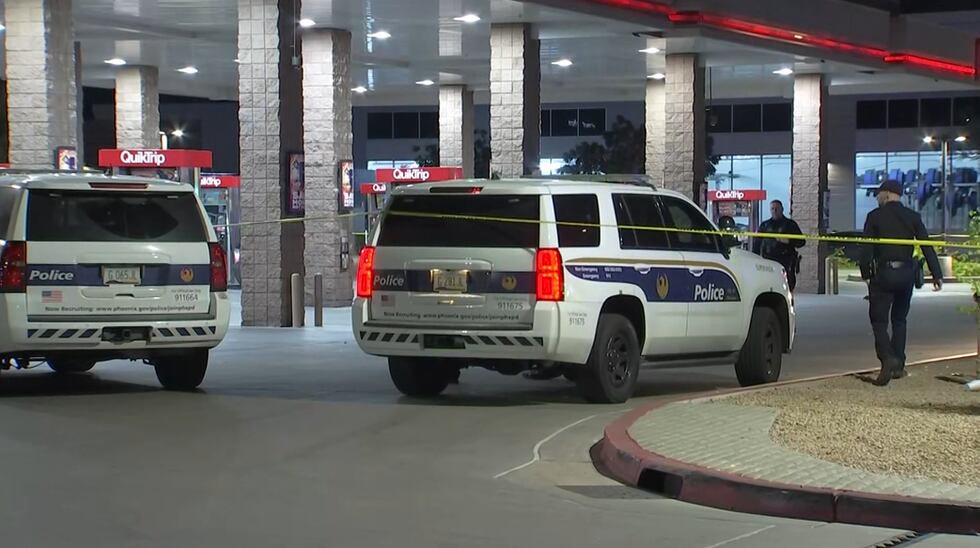 Police respond after a person was stabbed at a north Phoenix gas station.