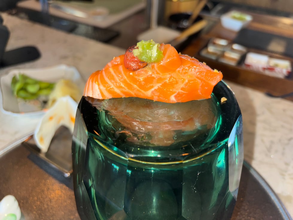 Scottish salmon and seared tomato sushi with wasabi.