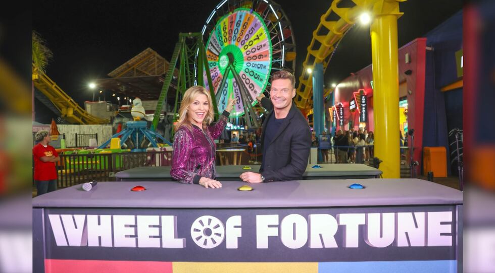 Ryan Seacrest and Vanna White host "Wheel of Fortune."