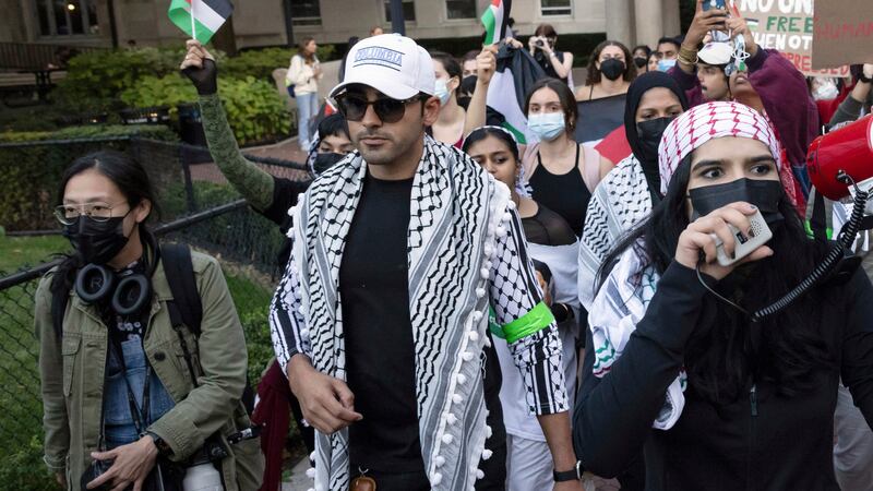 FILE - Mohsen Mahdawi, center, looks on during a pro-Palestinian protest at Columbia...