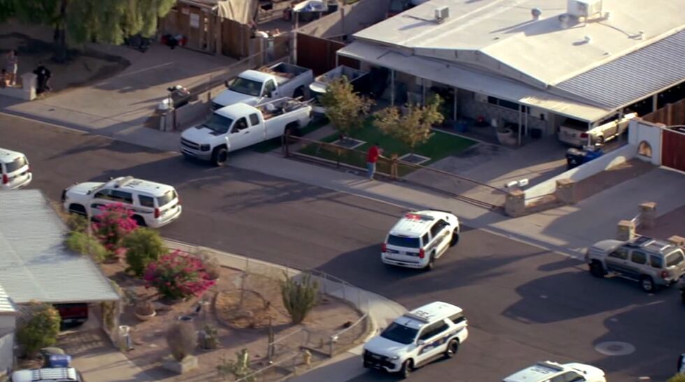 Police respond to a home in south Phoenix after reports of a shooting.