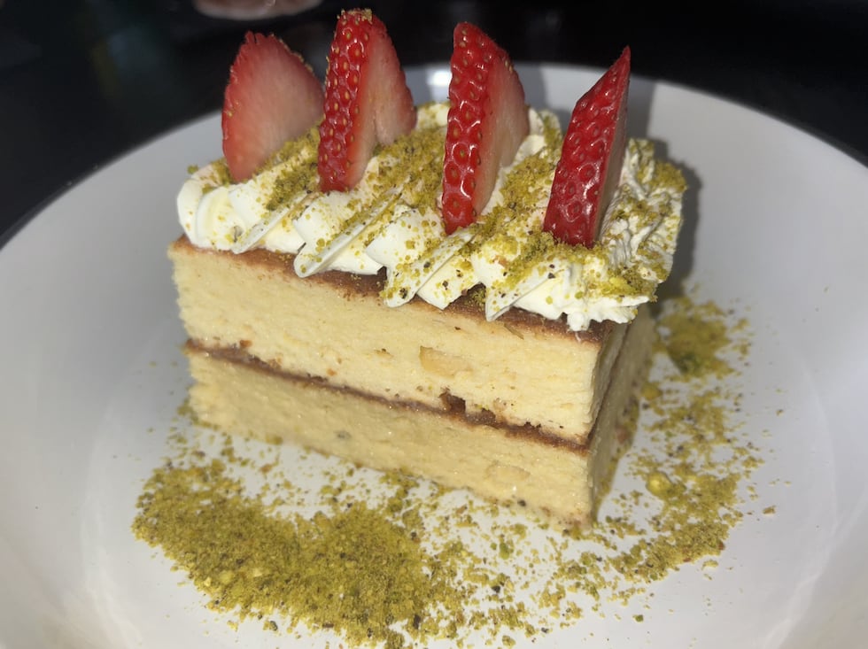 The Pistachio Tres Leches is a gluten-free cake with a light, pistachio cream and topped with...