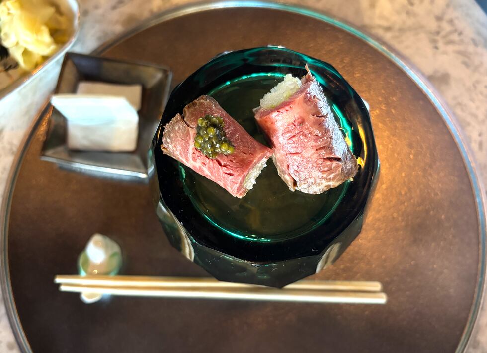 Wagyu beef sushi with caviar (left) or truffle salt (right).
