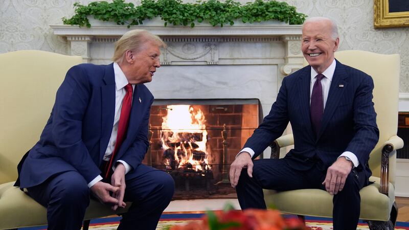 President Joe Biden meets with President-elect Donald Trump in the Oval Office of the White...