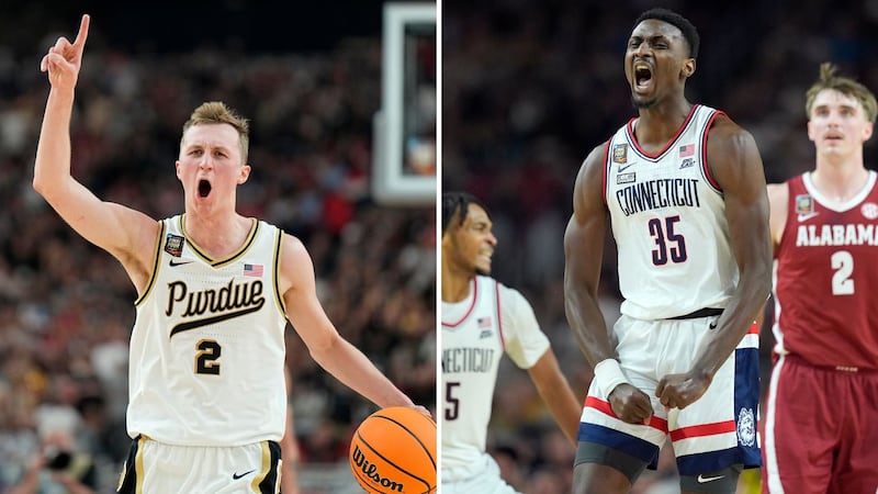 Purdue guard Fletcher Loyer and UConn forward Samson Johnson celebrate during the second half...