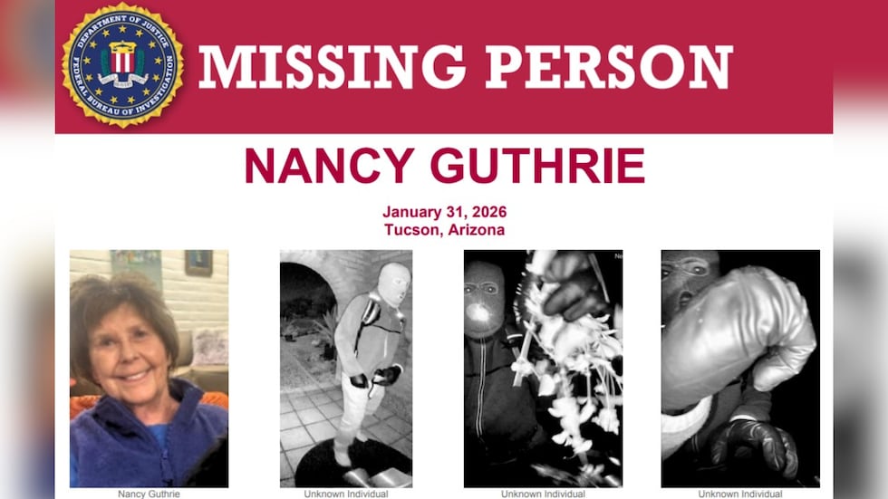 The FBI says new images show an armed individual appearing to have tampered with the camera at...