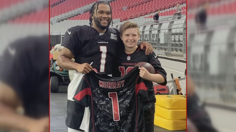 Zak was led on the field at State Farm Stadium when Murray walked over to deliver the jersey...