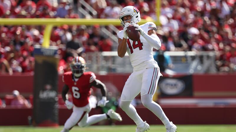 Arizona Cardinals wide receiver Michael Wilson (14) catches a pass in front of San Francisco...