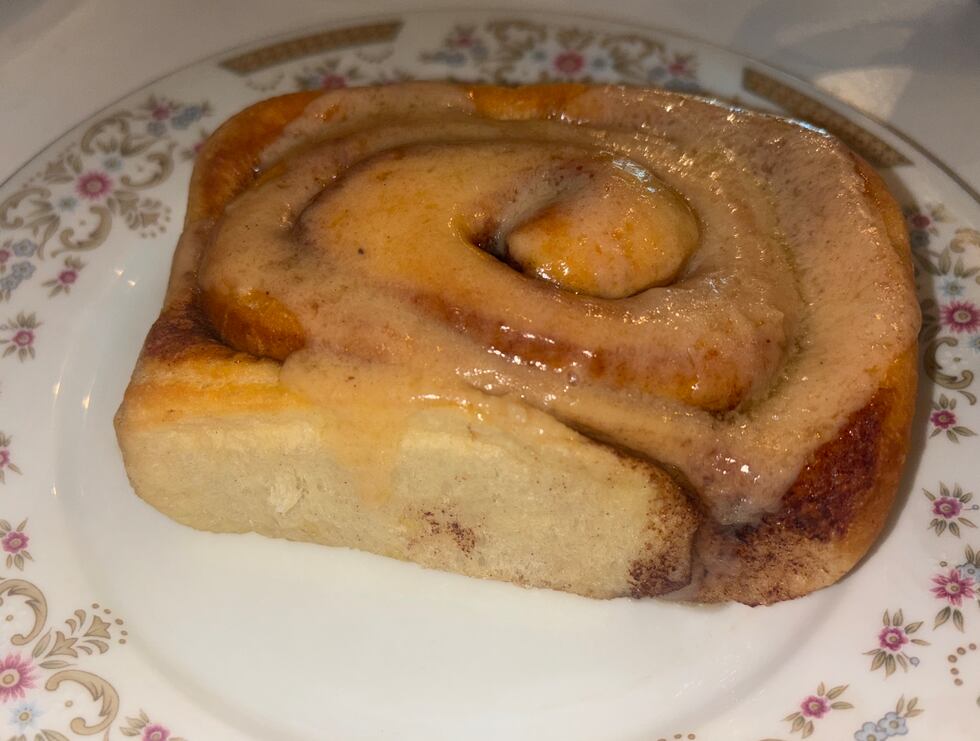Mega cinnamon roll with buttercream frosting