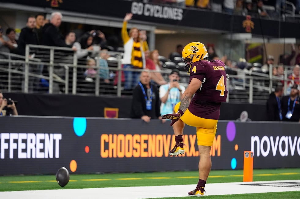 Arizona State running back Cam Skattebo (4) celebrates after running the ball for a touchdown...