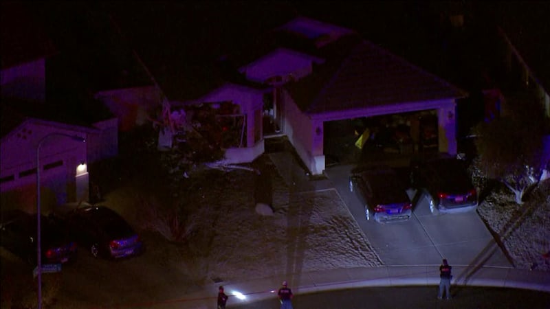 A car crashed into a home after a shooting in a neighborhood near Avondale Boulevard and Van...