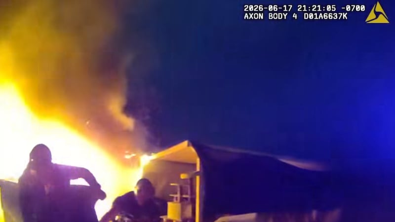 Three Mesa police officers were hospitalized for smoke inhalation after helping rescue two...