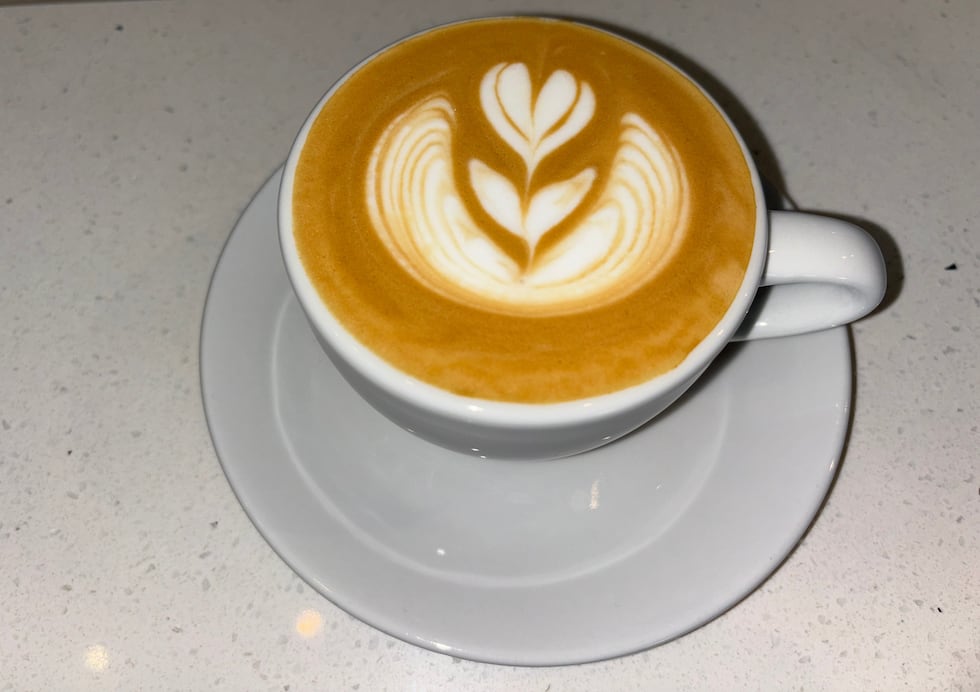 Traditional latte from Grounds to Thrive. Seven flavors, oat and almond milk are available...