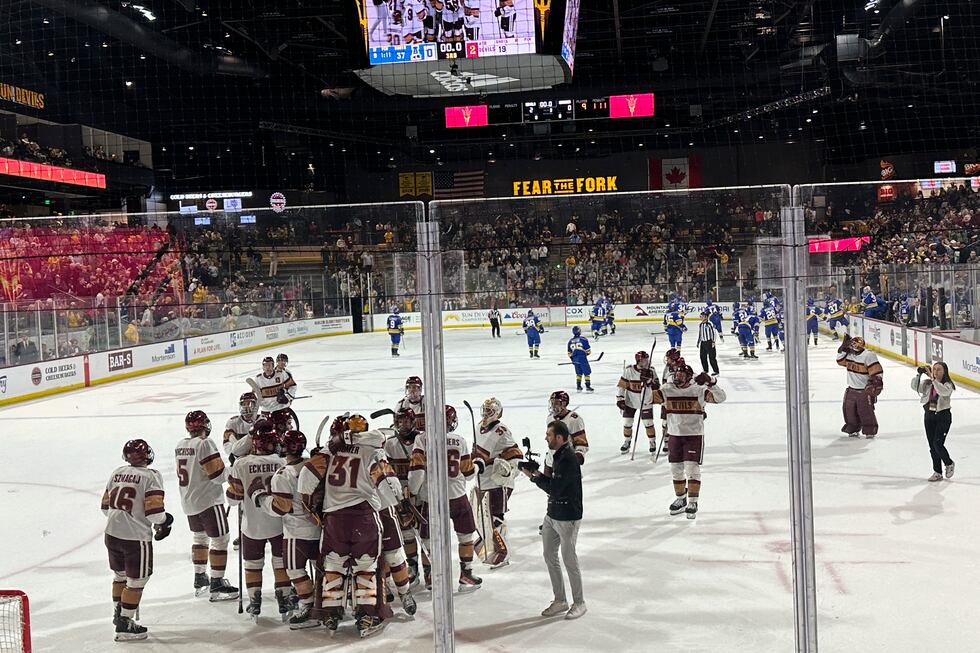 FILE - Arizona State players celebrate after beating Alaska Anchorage in an NCAA college...