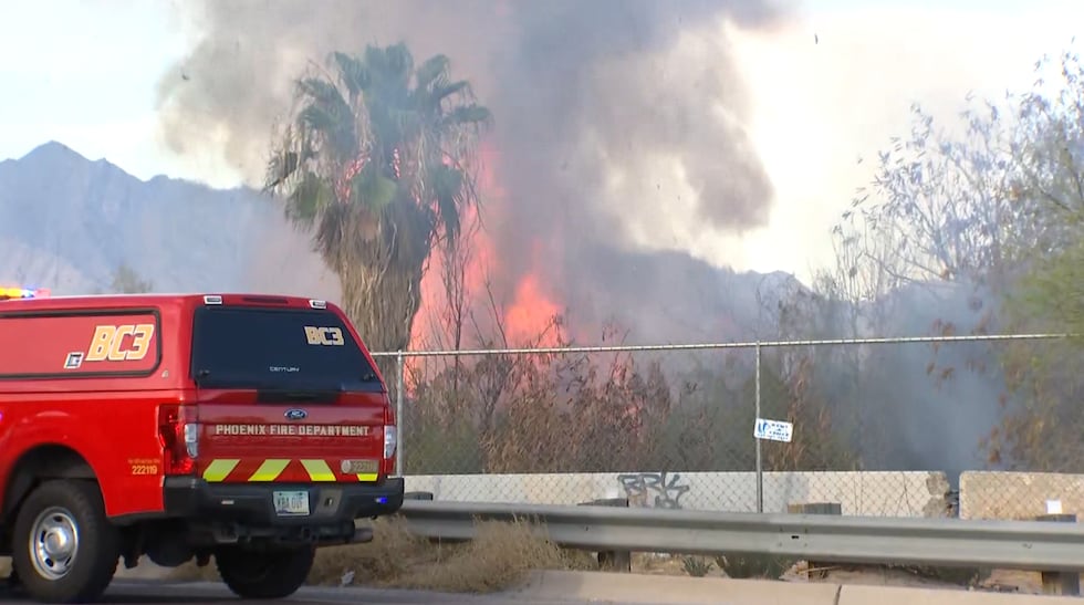 A brush fire has closed part of 51st Avenue in Phoenix.