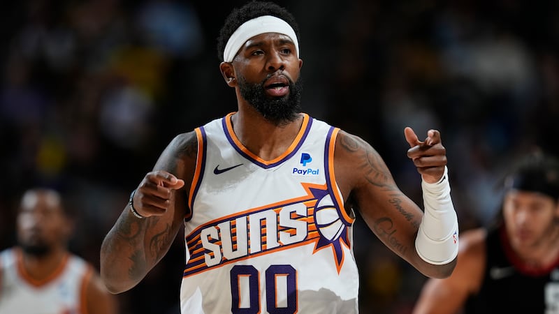 Phoenix Suns forward Royce O'Neale (00) in the second half of an NBA basketball game...