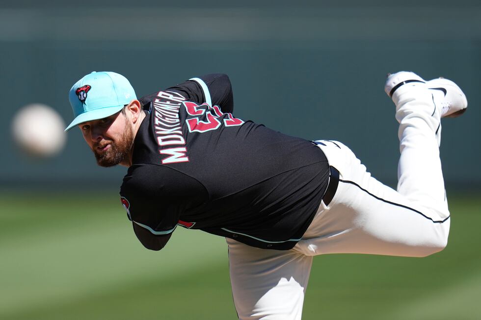 Arizona Diamondbacks starting pitcher Jordan Montgomery warms up during the second inning of a...
