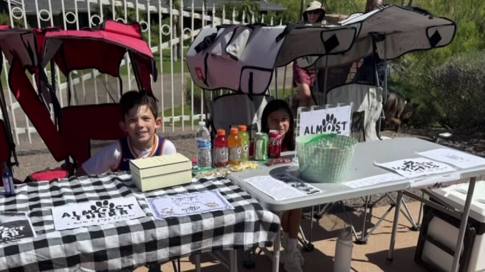 9-year-old Eli's snack stand was raising money for the Almost There Rescue in central Phoenix.
