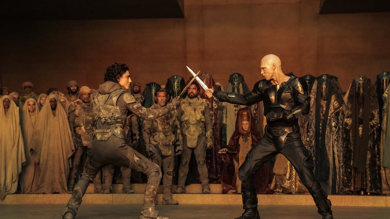 (L-R) TIMOTHÉE CHALAMET as Paul Atreides and AUSTIN BUTLER as Feyd-Rautha Harkonnen in Warner...
