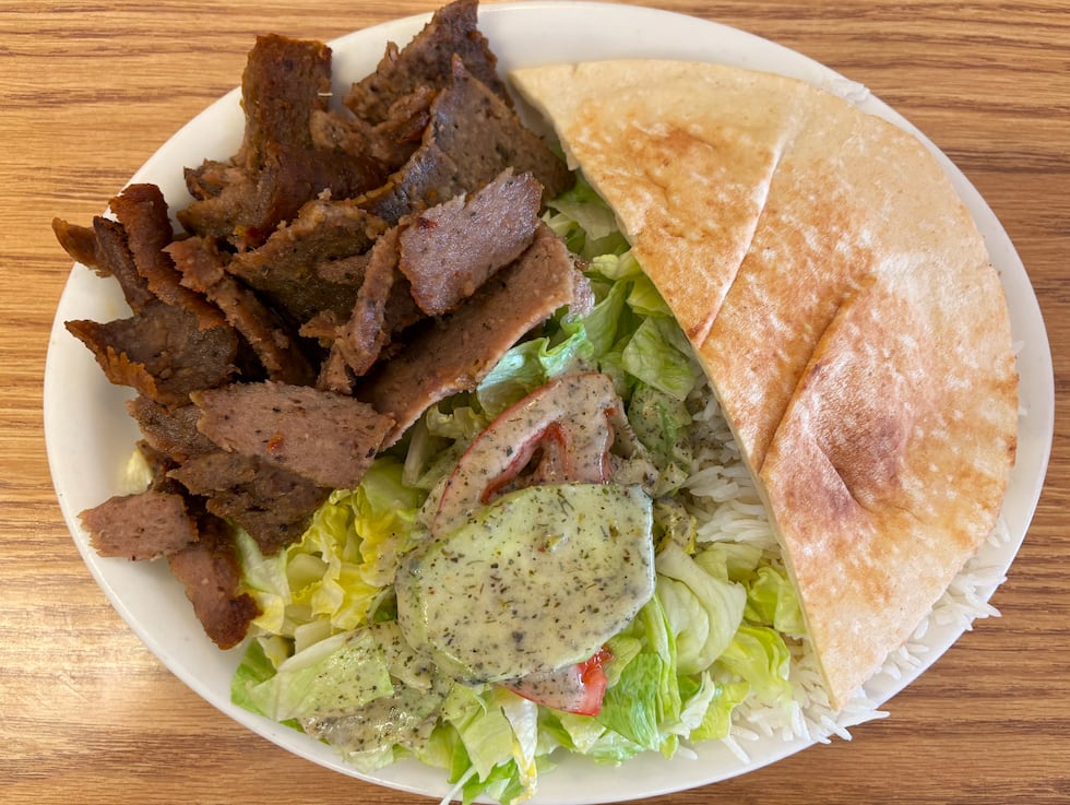 franetic-digital-marketing Gyro plate with seasoned lamb and beef cooked on a spit, rice, salad and pita bread