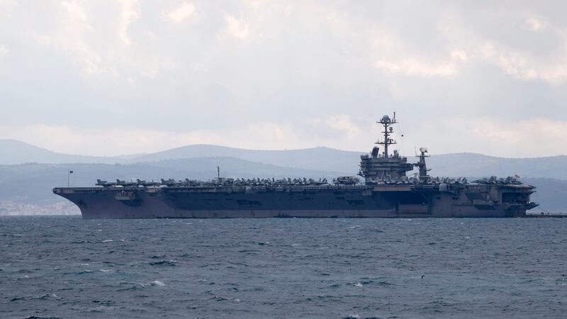 FILE - Aircraft carrier USS Harry S. Truman is moored near Split, Croatia, Feb. 14, 2022. (AP...