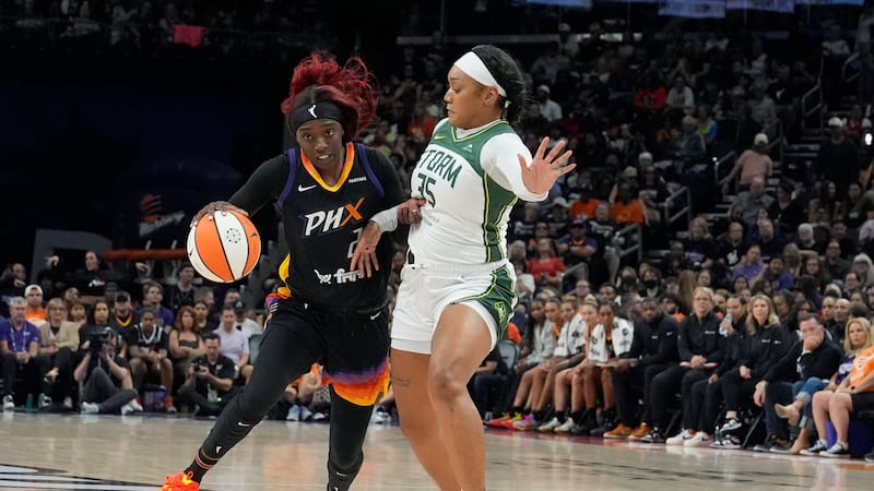 Phoenix Mercury guard Kahleah Copper (2) dribbles the ball against Seattle Storm guard...
