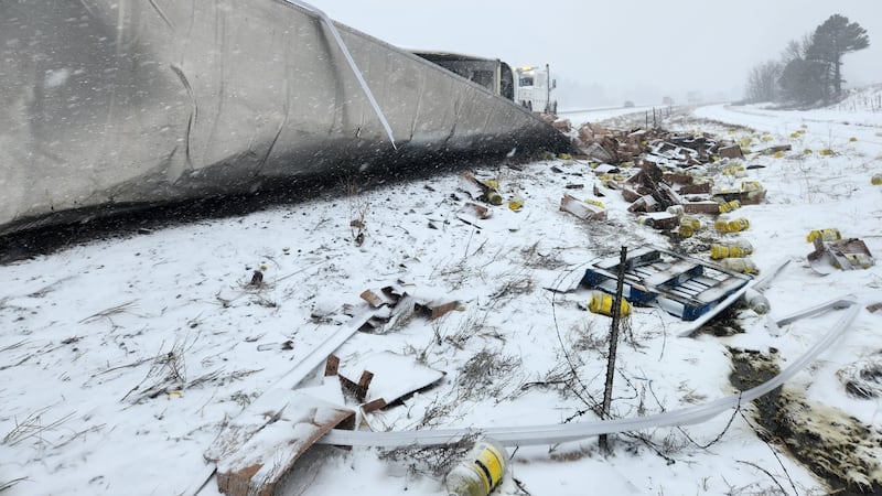 The driver of a tractor-trailer lost control of his vehicle on the icy highway and struck a...