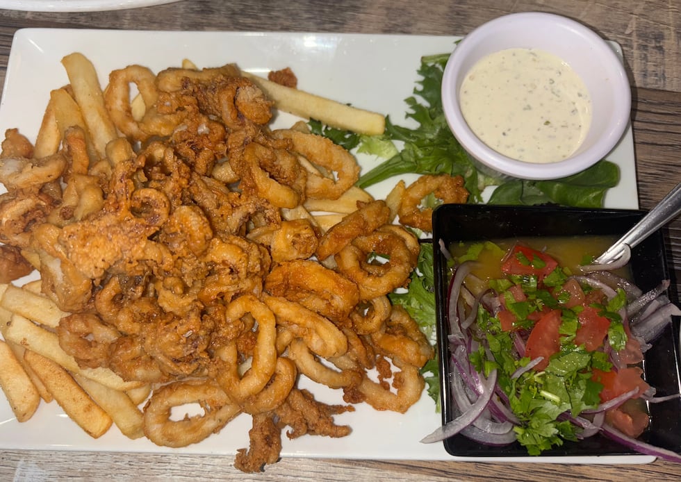 Fried calamari Peruvian style, served with salsa criolla and fries