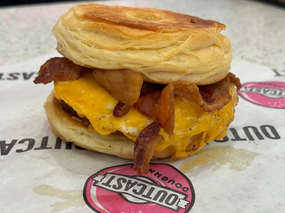 The Standard breakfast sandwich is made with an egg, hash browns, cheddar cheese, and bacon or...
