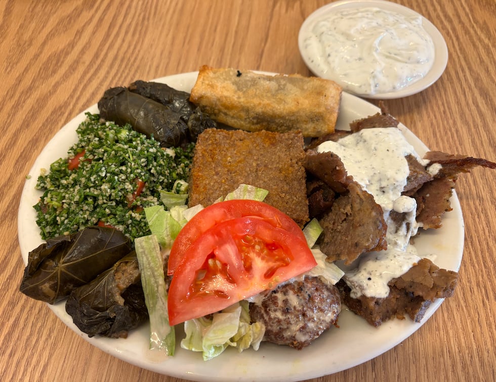 franetic-digital-marketing Combination plate served with gyro meat, sanbusek, tabouli, kibbi, stuffed grape leaves, falafel and yoghurt sauce.