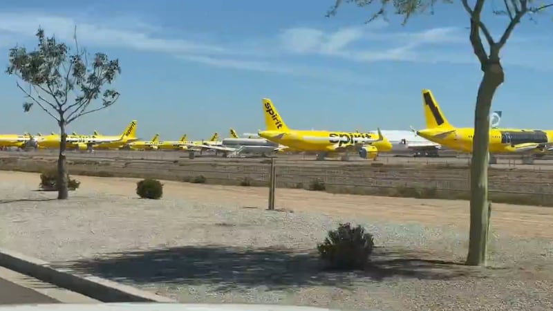 Spirit jets are parked at Phoenix Goodyear Airport after leaving Sky Harbor, as the airline...