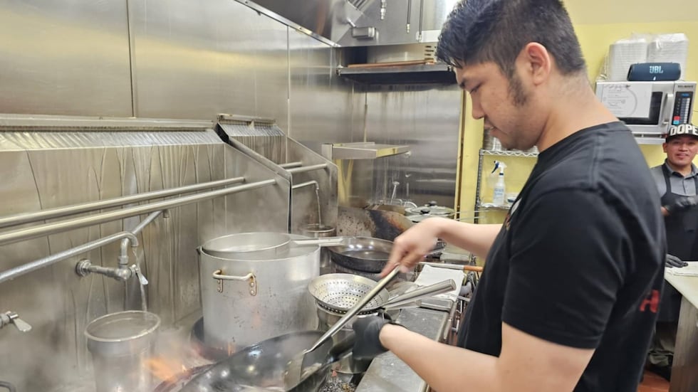Happy Bao owner, Matthew Ma, cooks the popular beef chow fun made with handmade noodles.