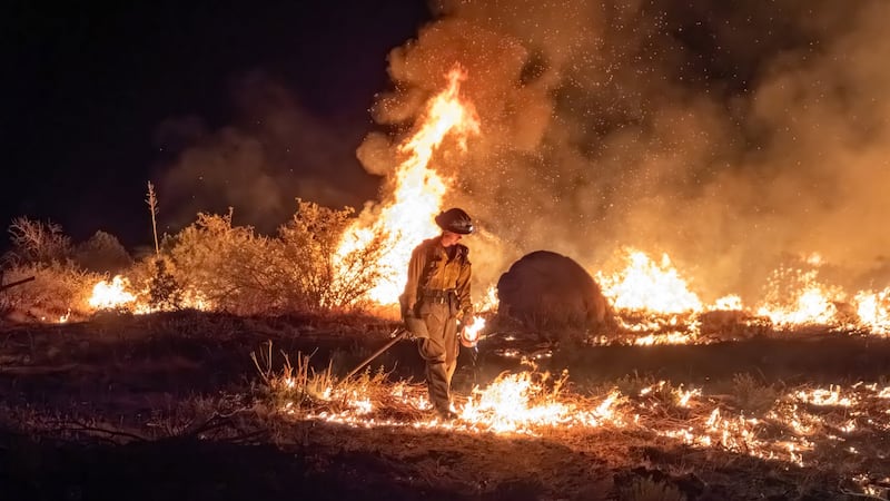 Firefighters battle the Sycamore Fire burning over 10,000 acres in the Tonto National Forest.