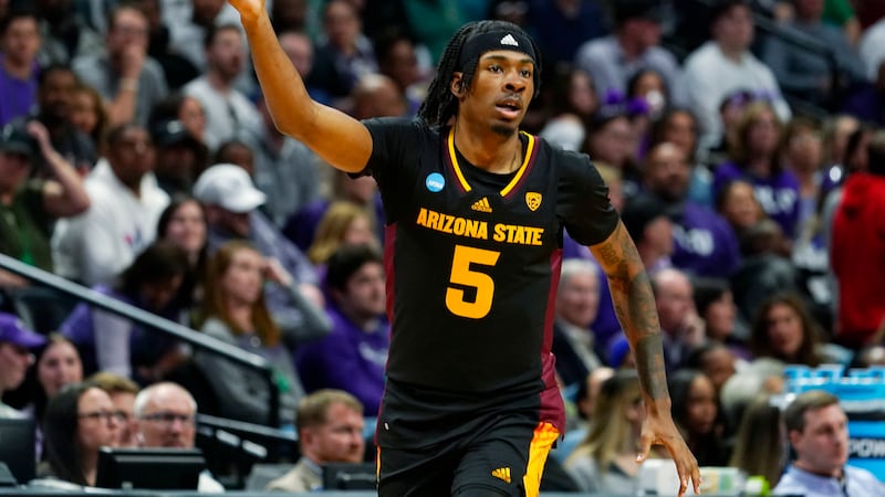 Arizona State forward Jamiya Neal gestures after hitting a basket against TCU in the first...