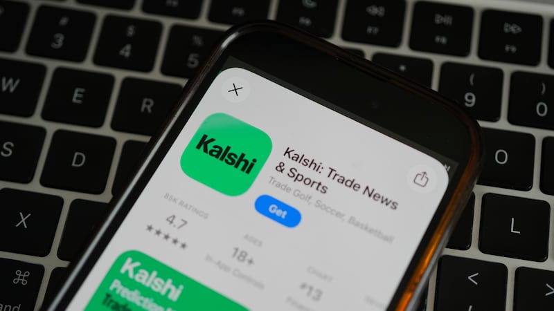 FILE - An ad for the prediction market app Kalshi is displayed on a mobile phone Thursday,...