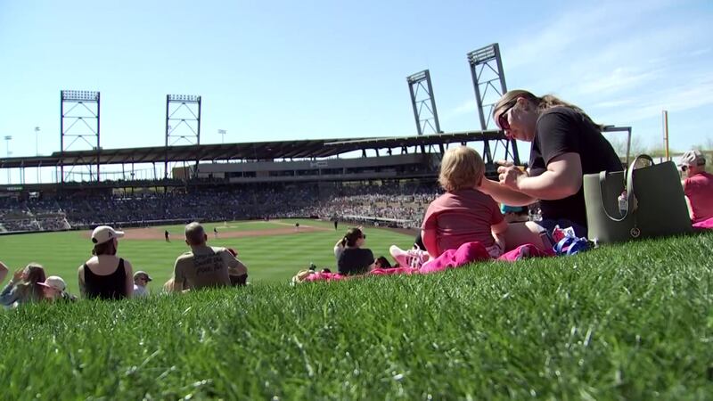 Thousands of baseball fans filled the stands and the outfield lawn at Salt River Fields to...