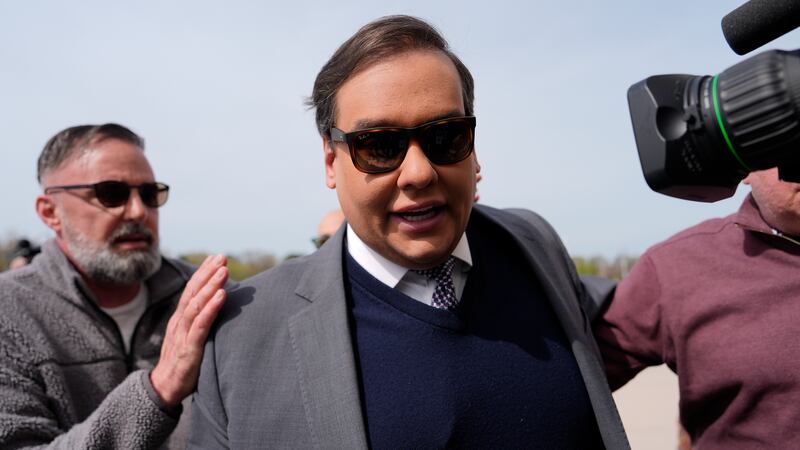 Former U.S. Rep. George Santos arrives at federal court for sentencing, Friday, April 25,...