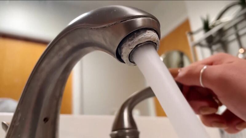 File of tap water coming out of faucet.
