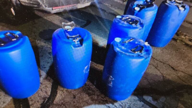 The second vehicle had several blue 55-gallon drums that smelled like gasoline in the back.