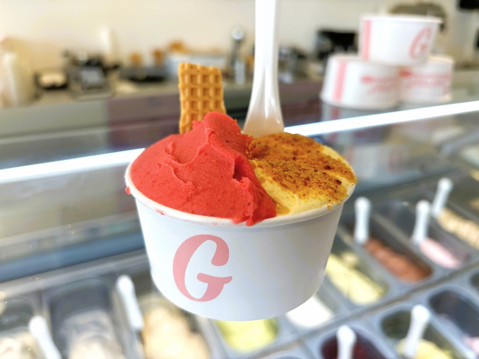 Medium gelato cup with raspberry sorbet (left) and crème brûlée gelato (right) served with...